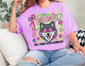 Purple Tall Pines STEM Academy Timberwolves tee with a wolf in pink star glasses, a bow, colorful stripes, and stars